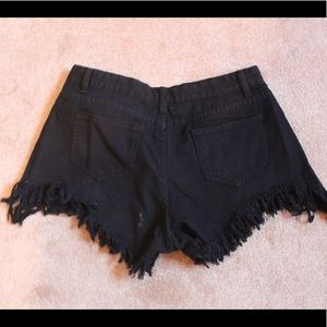 Black frayed shorts
